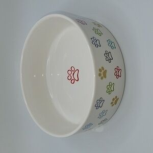 Fringe STUDIO dog or cat food bowl.  5" in Dia. 2" high.  Paw prints.